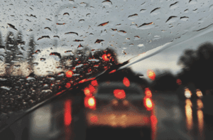 best west Michigan car accident injury lawyer near me helps with car accident on a grey rainy day